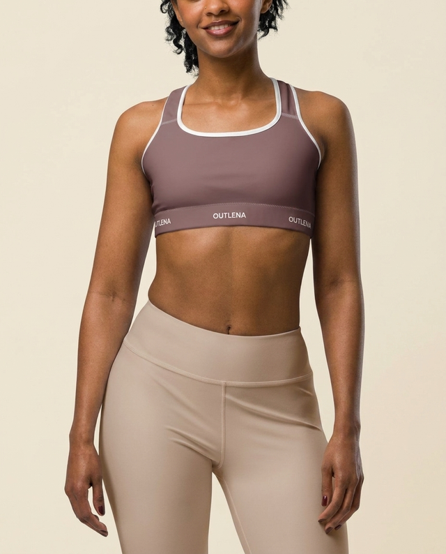 Model wearing OUTLENA Elevate Contrast Sports Bra Dusty Mauve