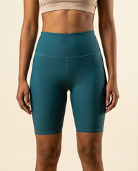 OUTLENA Sculpt Biker Shorts Deep Teal, front on model