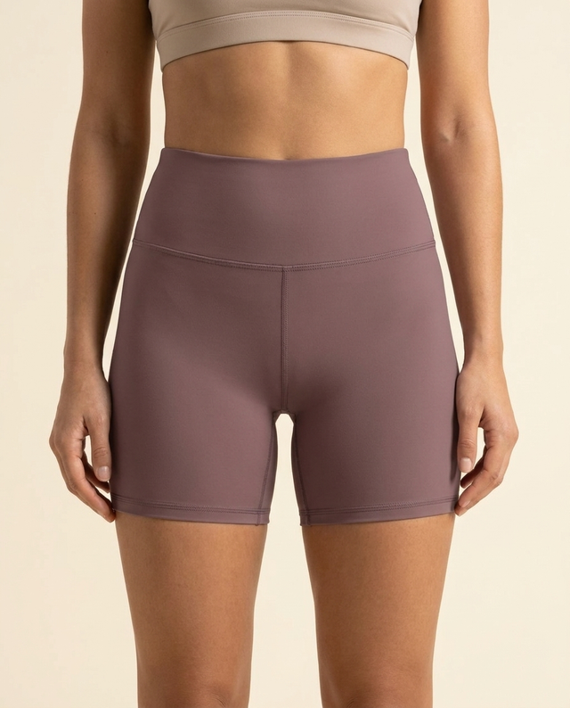 OUTLENA Sculpt Biker Shorts Dusty Mauve, front on model