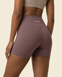 OUTLENA Sculpt Biker Shorts Dusty Mauve, back with OUTLENA logo