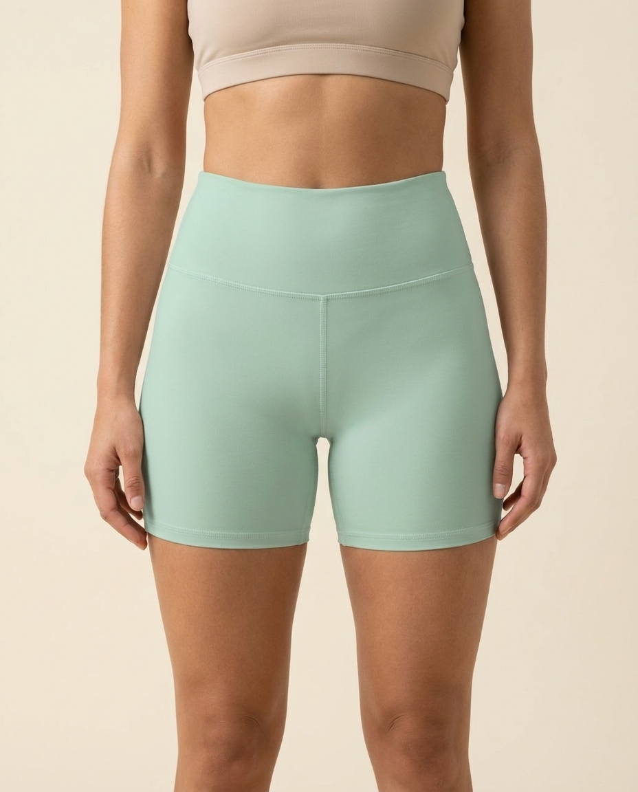 OUTLENA Sculpt Yoga Shorts Soft Mint, front on model