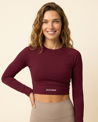 OUTLENA model wearing PowerSculpt Long-Sleeve Crop Top Cherry Burgundy, front